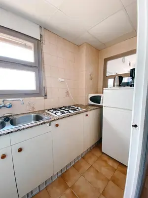Una cocina o zona de cocina en Apartamento en Torre Valentina con vista al mar