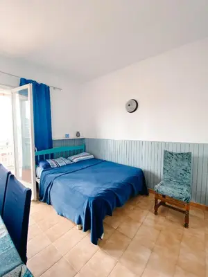 Cama o camas de una habitación en Apartamento en Torre Valentina con vista al mar