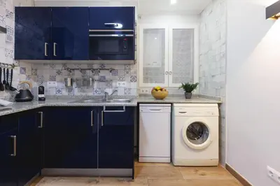 Una cocina o zona de cocina en Bravissimo Figuerola, Spacious 3-bedroom apartment