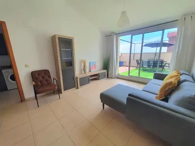 Zona de estar de Penthouse Blanes