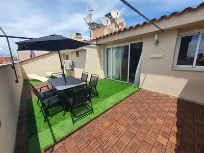 Un patio o zona al aire libre en Penthouse Blanes