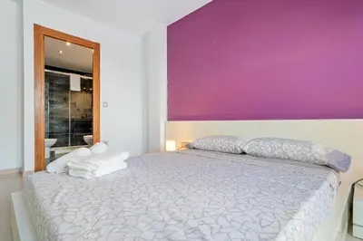 Cama o camas de una habitación en Hauzify I Apartament Ponent