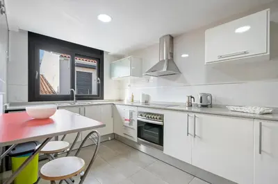 Una cocina o zona de cocina en Hauzify I Apartament Ponent