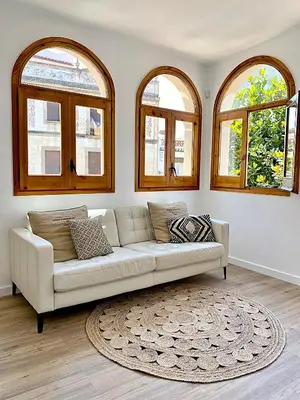 Zona de estar de Historic House at Can Quintana by Casa de Elena