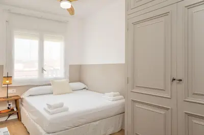 Cama o camas de una habitación en Flateli Sant Antoni 6