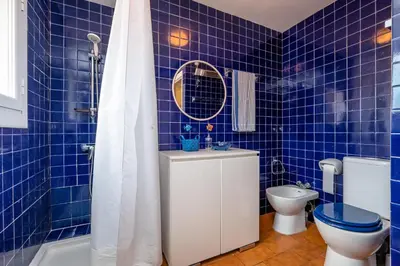 Un baño de SR-54 BEGUR SA RIERA 4 Pax