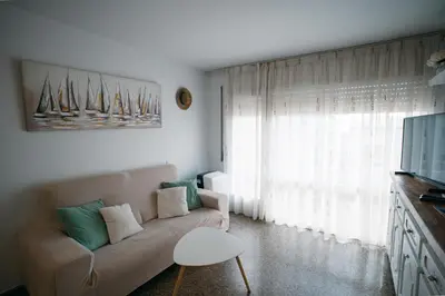 Zona de estar de Apartamento Floral al centro de Palamós con Wi-Fi