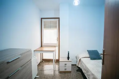 Cama o camas de una habitación en Apartamento Floral al centro de Palamós con Wi-Fi