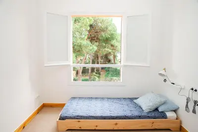 Cama o camas de una habitación en Can KIKA