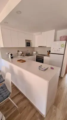 Una cocina o zona de cocina en Casa Mistral Reformado