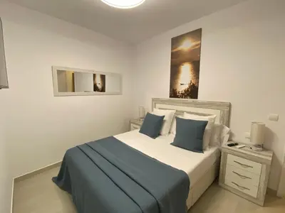 Cama o camas de una habitación en APARTAMENTS L’ARC