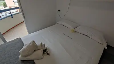 Cama o camas de una habitación en VILLAS COSETTE Apartamento Hossne
