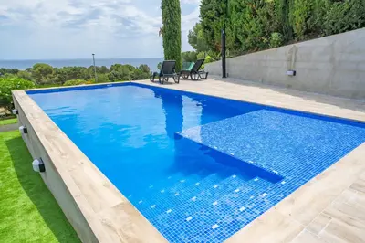 Piscina en o cerca de Villa Santa Cristina Primera Línea Playa Piscina Barbacoa Aire Acondicionado