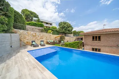 Piscina en o cerca de Villa Santa Cristina Primera Línea Playa Piscina Barbacoa Aire Acondicionado