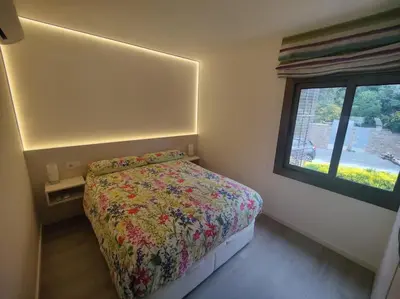 Cama o camas de una habitación en Piso reformado a pie de playa Sa Riera Begur
