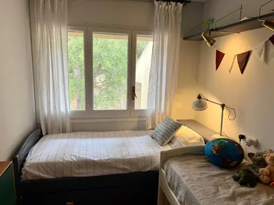 Cama o camas de una habitación en Vistas Mediterrani, maravillosas vistas en amplio apartamento con terraza, y piscina en zona de jardin