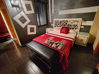 Cama o camas de una habitación en Hostal Manel