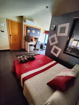 Cama o camas de una habitación en Hostal Manel