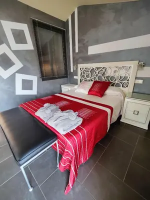 Cama o camas de una habitación en Hostal Manel