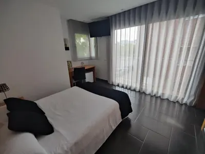 Cama o camas de una habitación en Hostal Manel