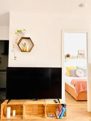 Una televisión o centro de entretenimiento en Fantástico piso en Tossa de Mar