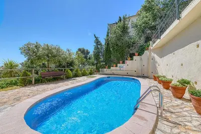 Piscina en o cerca de apartament amb piscina comunitària al Golfet