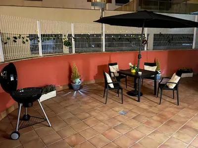 Un restaurante o sitio para comer en Grand Apartament Lloret