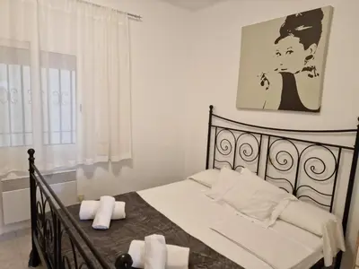 Cama o camas de una habitación en Primera linea Sant Antoni