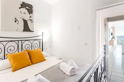 Cama o camas de una habitación en Primera linea Sant Antoni