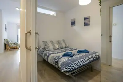 Cama o camas de una habitación en Flateli Lorenzana 17