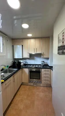 Una cocina o zona de cocina en Apartaments Platja d’Aro