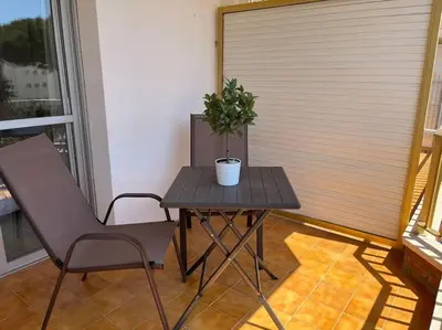 Un balcón o terraza de Nice new flat near the beach