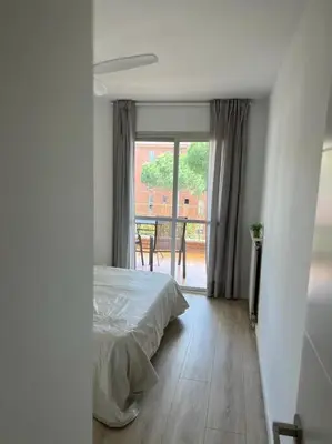 Cama o camas de una habitación en Nice new flat near the beach