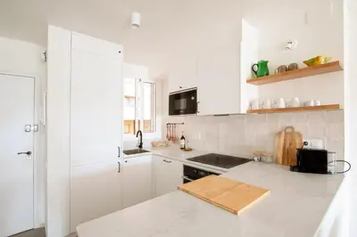 Una televisión o centro de entretenimiento en Precioso apartamento en Platja d'Aro, Costa Brava.