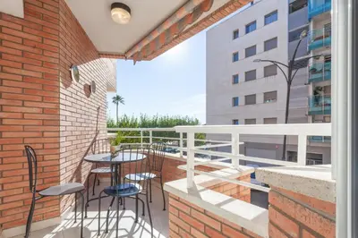 Un balcón o terraza de Fantástico apartamento en la playa. A/A y vistas