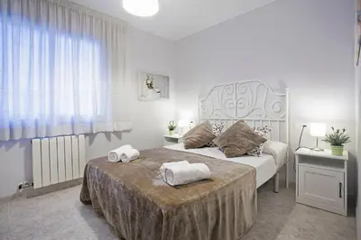 Cama o camas de una habitación en Fantástico apartamento en la playa. A/A y vistas
