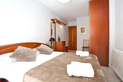 Cama o camas de una habitación en Fantástico apartamento en la playa. A/A y vistas