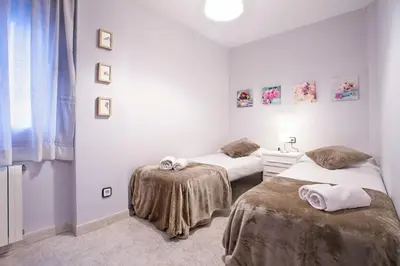 Cama o camas de una habitación en Fantástico apartamento en la playa. A/A y vistas