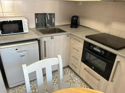 Una cocina o zona de cocina en CARIBOU LOTUS NEW