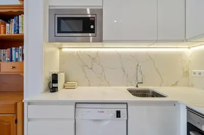 Una cocina o zona de cocina en Hauzify I Apartament Joy