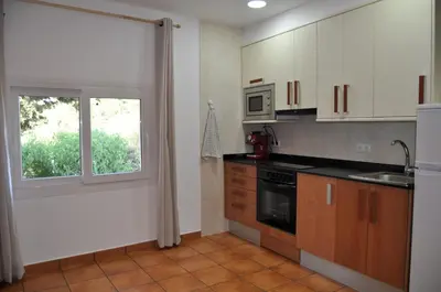 Una cocina o zona de cocina en Acogedor apartamento en entorno rural