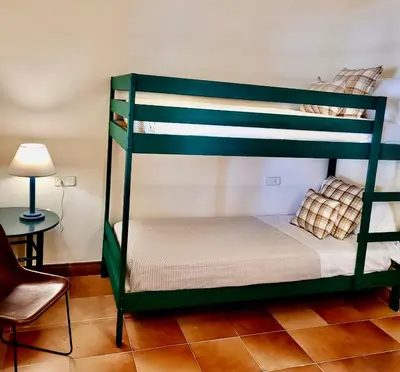 Cama o camas de una habitación en Casa de campo en el Empordà