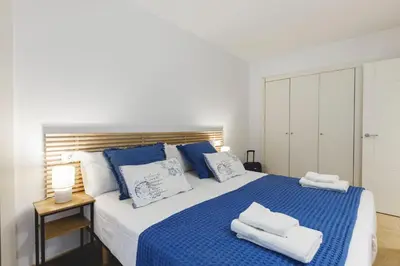 Cama o camas de una habitación en Bravissimo Plaça Catalunya, 2-bedroom apartment with terrace