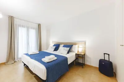 Cama o camas de una habitación en Bravissimo Plaça Catalunya, 2-bedroom apartment with terrace