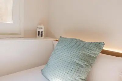 Cama o camas de una habitación en Bravissimo Cort Reial Duplex, Spacious with 3 bedrooms