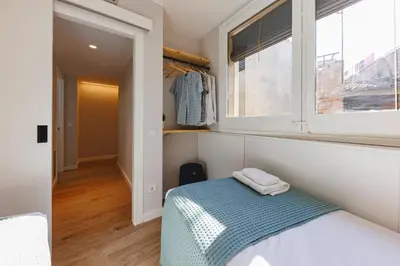 Cama o camas de una habitación en Bravissimo Cort Reial Duplex, Spacious with 3 bedrooms