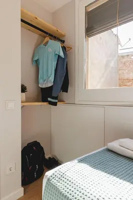 Cama o camas de una habitación en Bravissimo Cort Reial Duplex, Spacious with 3 bedrooms