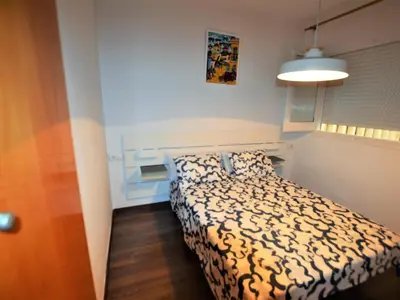 Cama o camas de una habitación en Apartment Sant Trop 5 pax Lloret de mar
