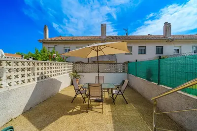 Un balcón o terraza de HomeHolidaysRentals Anglada - Costa Barcelona