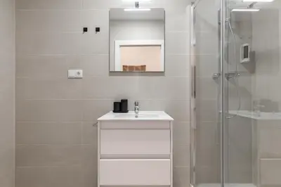 Un baño de Calella Apartments by Olala Homes